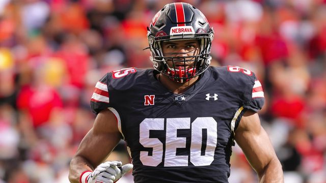 Nebraska football player with 'SEO' on his shirt.