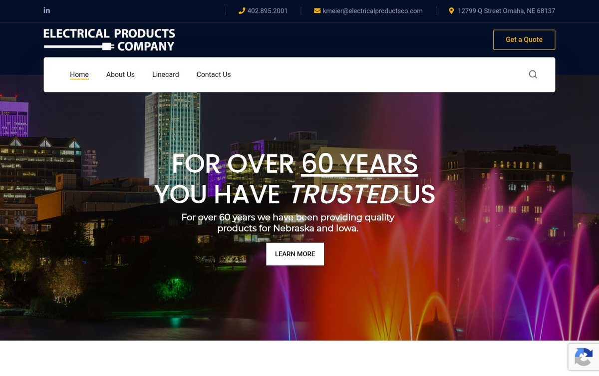 Home page of the Electrical Products Company website: Deep navy header with gold accents and a bold, full-width hero image.