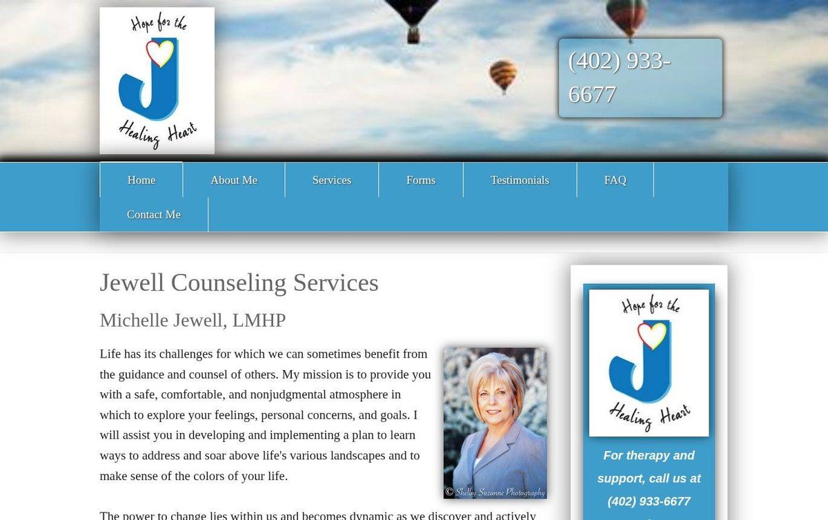 Home page of the Jewell Counseling website: Soft sky-blue header with a warm portrait and a clear text column.